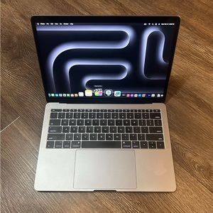 MacBook with over 1k pre installed software